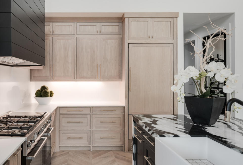 <p>Natural materials and a bold countertop on a kitchen island.</p><p>Bertazzoni, Courtesy of Designer Julee Ireland Design Build, Ambia Photography</p>