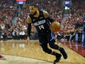 Apr 13, 2019; Toronto, Ontario, CAN; Orlando Magic guard D.J. Augustin (14) drives to the net against the Toronto Raptors during game one of the first round of the 2019 NBA Playoffs at Scotiabank Arena. Orlando defeated Toronto. Mandatory Credit: John E. Sokolowski-USA TODAY Sports