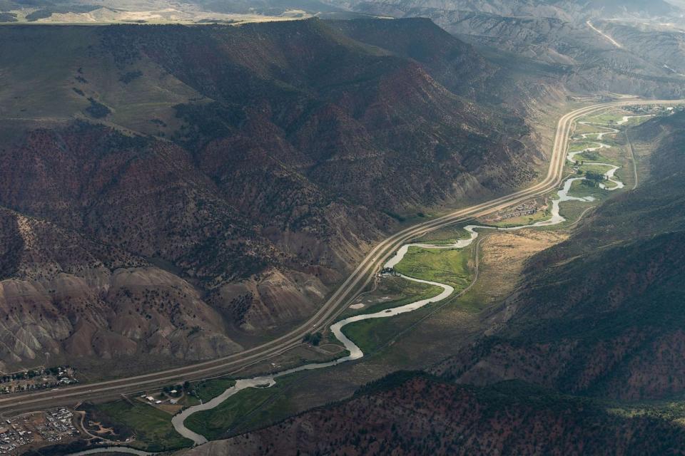 PHOTO: The Eagle River flows toward the Colorado River during a LightHawk flight in Gypsum, Colo., July 12, 2023. The Colorado River Basin stretches through seven states - Arizona, California, Nevada, Utah, Colorado, Wyoming and New Mexico. (Eric Lee/Bloomberg via Getty Images)