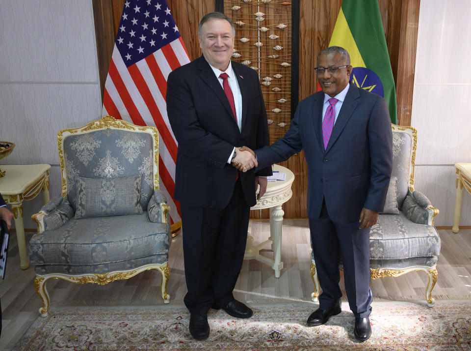 US Secretary of State Mike Pompeo, left, meets with Ethiopian Minister of Foreign Affairs Gedu Andargachew at the Foreign Ministry in Addis Ababa, Tuesday Feb. 18, 2020. Pompeo's visit to Africa is the first by a Cabinet official in 18 months. (Andrew Caballero-Reynolds/Pool via AP)