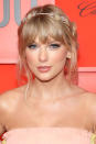 <p> Taylor Swift has graced us with a lot of cool updos over the course of her long career (if you like her style, you have...a wealth of inspo at your fingertips). This soft and gentle look is probably one of my faves: In case you missed it, she used to wear her hair <em>very</em> curled, and this gentler, wavy but not too curated look is a lovely evolution of her style (just like her "Eras" tour! Sorry, had to). I love the piece-y nature of it, with the bangs, front fringe, and even a long strand in the front, with a messy braid in the back. It feels like Taylor, just more evolved. </p>