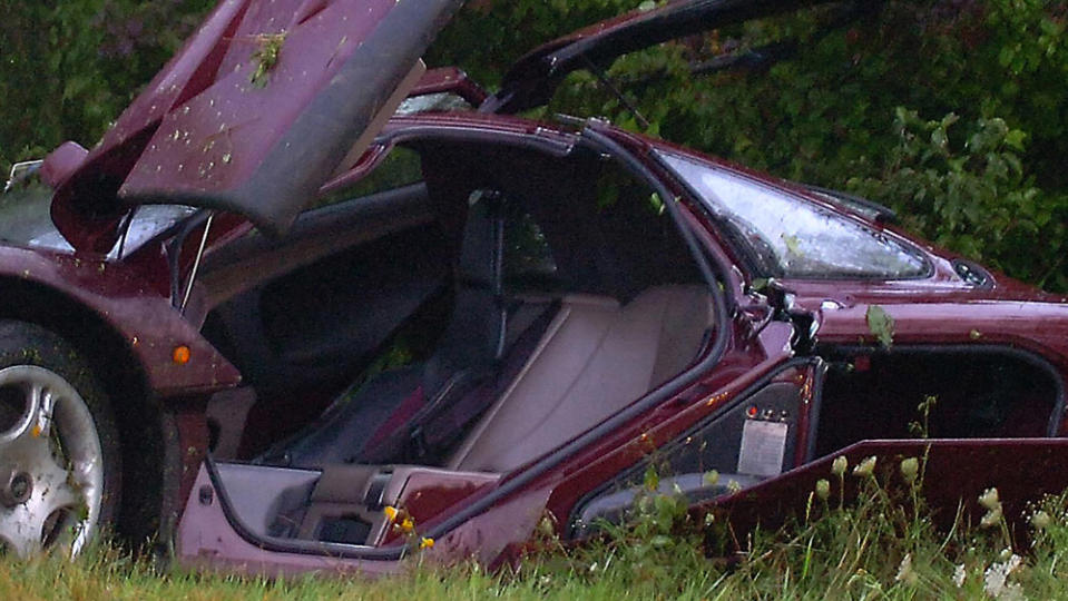 A McLaren F1 that has crashed.