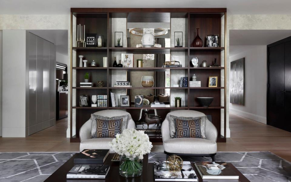 Bespoke shelving designed by Oliver Burns for a Marylebone flat