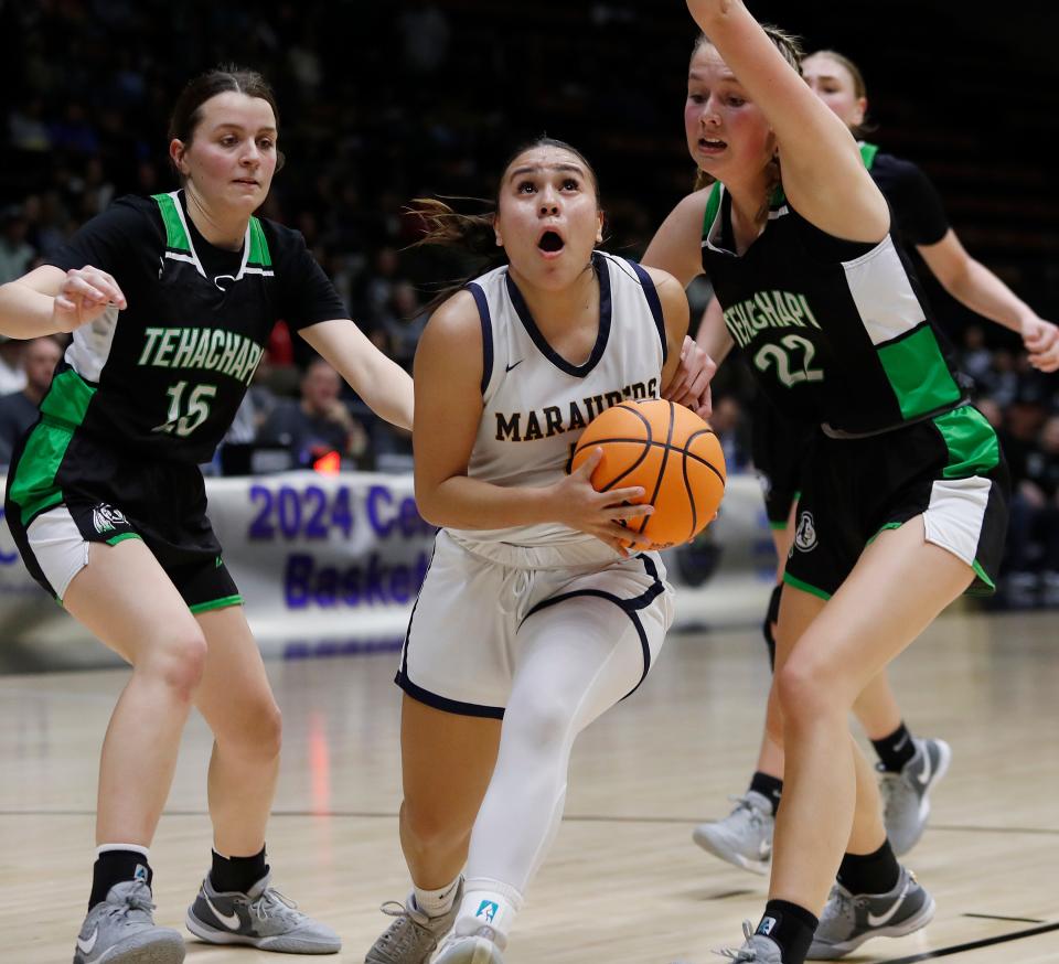 Monache's MVP Alisha Verdejo drives against Tehachapi during their Central Section Division II high school girls basketball championship game at Selland Arena on Friday, Feb. 23, 2024 in Fresno, Calif. Monache won 41-37.