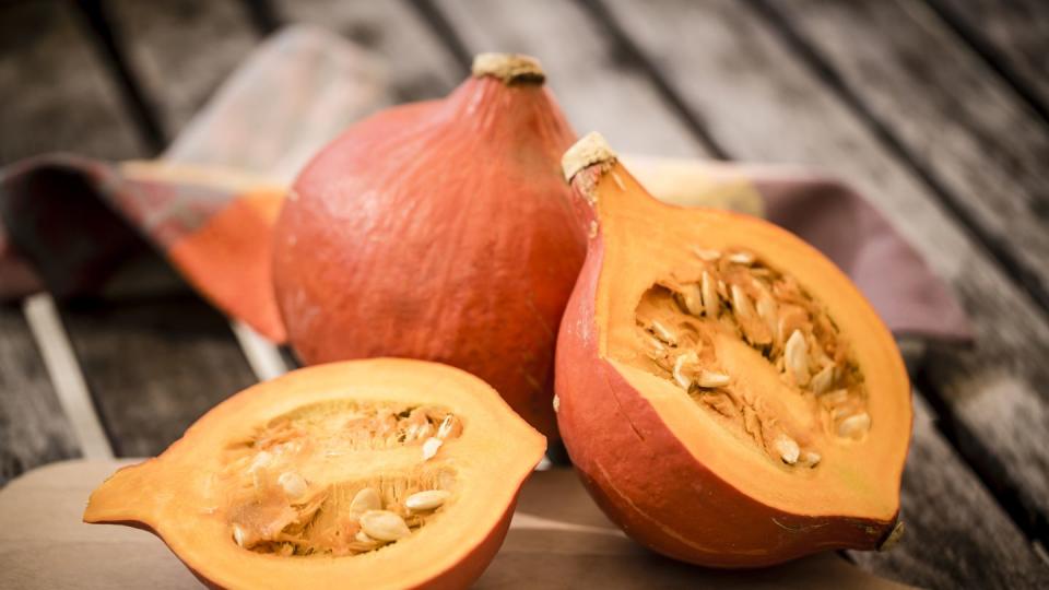 sliced and whole hokkaido pumpkin