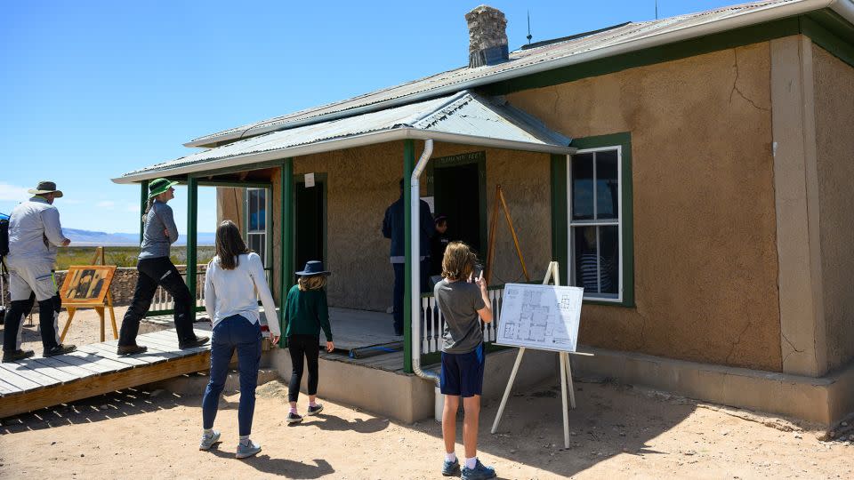 Tourists visit the McDonald ranch house at the Trinity Site at the White Sands Missile Range, New Mexico, on April 1, 2023. - Sam Wasson/Sipa USA/AP