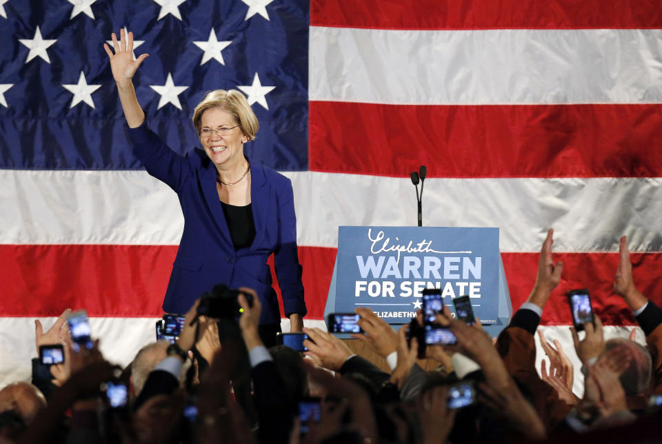 FILE - In this Nov. 6, 2012, file photo, Democrat Elizabeth Warren waves to the crowd before giving her victory speech after defeating incumbent GOP Sen. Scott Brown in the Massachusetts Senate race, during an election night rally at the Fairmont Copley Plaza hotel in Boston. Warren, who made her name as a consumer advocate in the wake of the 2008 financial crisis, will make her first appearance Sunday, Feb. 17, 2019, as a presidential candidate in Las Vegas, the boom-and-bust town that made Nevada the epicenter of the country's foreclosure crisis. (AP Photo/Michael Dwyer, File)