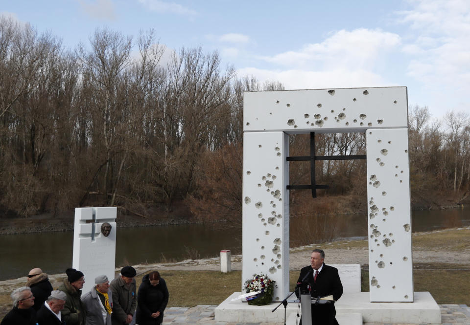 US Secretary of State Mike Pompeo delivers a speech at the Freedom Gate memorial in Bratislava, Slovakia, Tuesday, Feb. 12, 2019. Pompeo on Tuesday invoked the 30th anniversary of the demise of communism to implore countries in Central Europe to resist Chinese and Russian influence. (AP Photo/Petr David Josek)