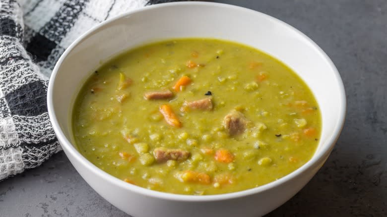 Pea and ham soup on counter