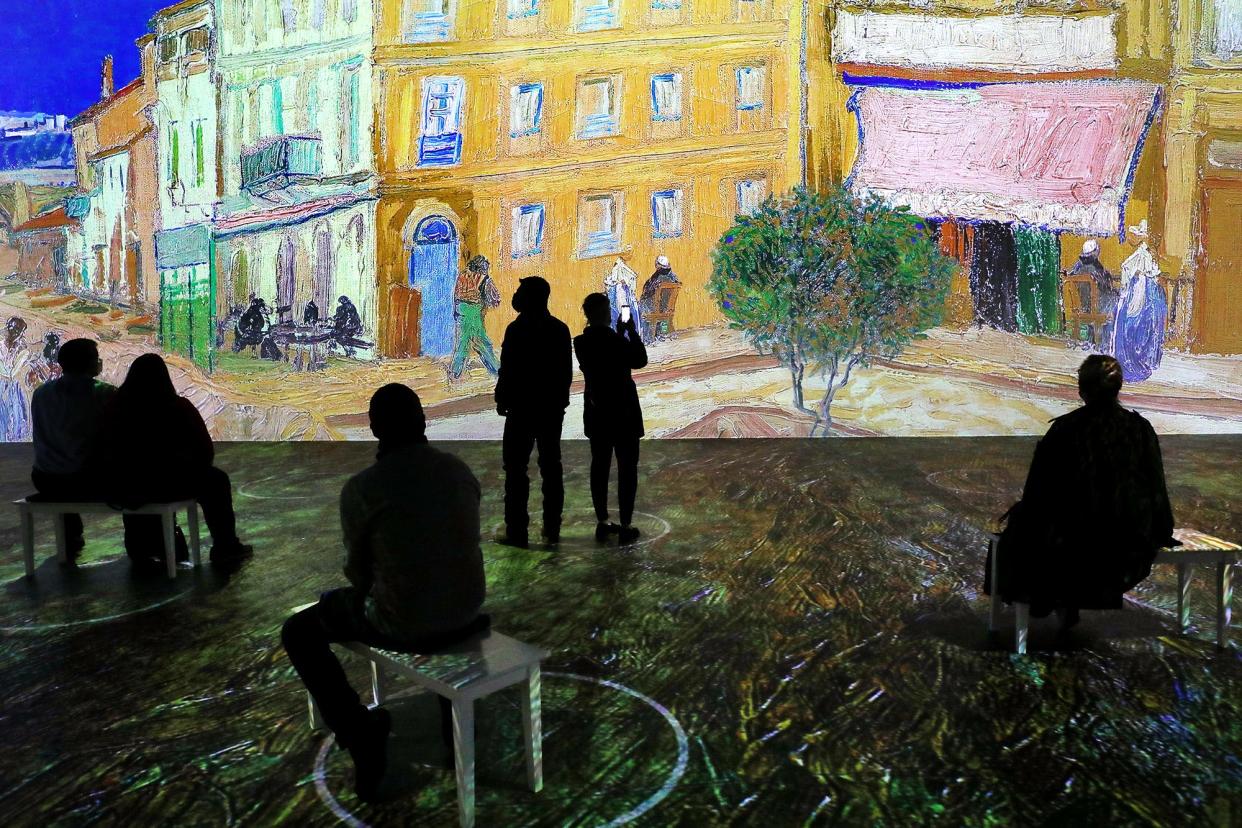 The "Immersive Van Gogh Columbus Exhibit" gives attendees a sense that they are part of the artwork.