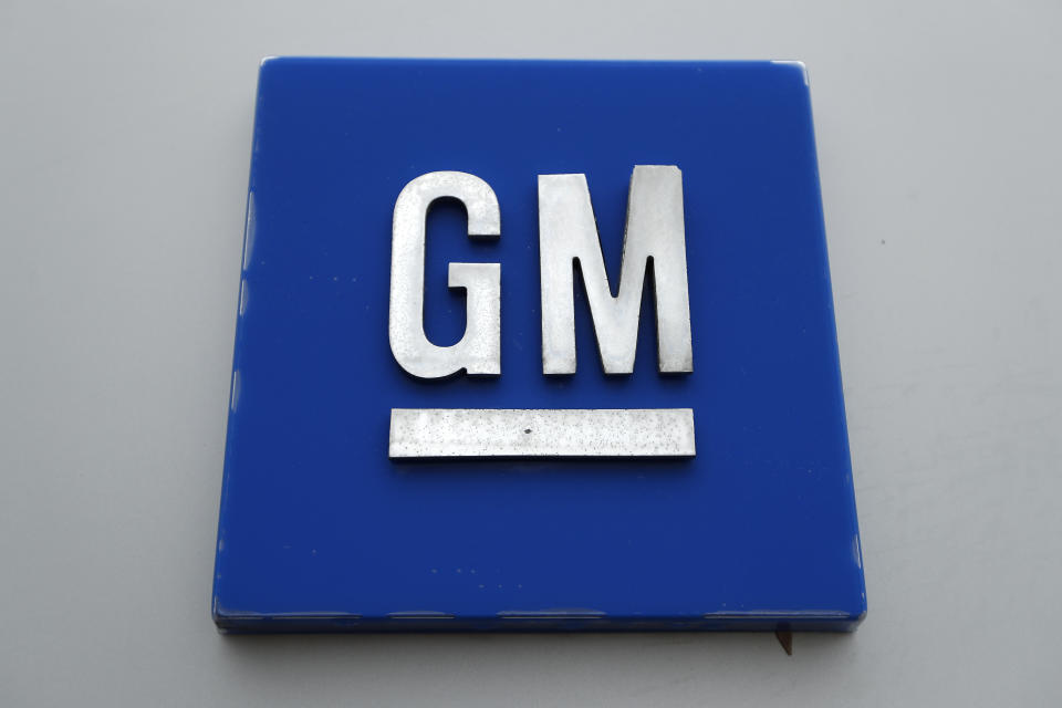 FILE - This Jan. 27, 2020, file photo shows a General Motors logo at the General Motors Detroit-Hamtramck Assembly plant in Hamtramck, Mich. GM is pulling out of Australia, New Zealand and Thailand as part of a strategy to exit markets that don't produce adequate returns on investments, the company said in a statement Sunday, Feb. 17. (AP Photo/Paul Sancya, File)