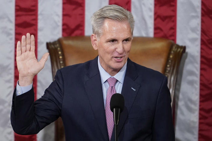 Dean of the House Rep. Hal Rogers, R-Ky., swears in Rep. Kevin McCarthy, R-Calif., as House Speaker on the House floor at the U.S. Capitol in Washington, early Saturday, Jan. 7, 2023. (AP Photo/Andrew Harnik)