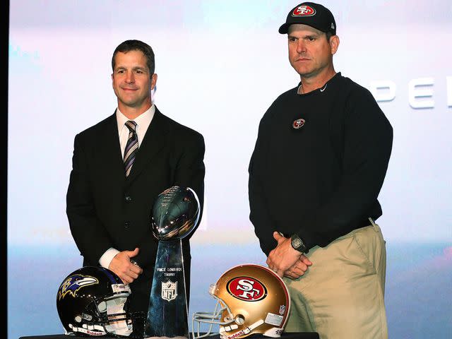 <p>Christian Petersen/Getty</p> John Harbaugh and Jim Harbaugh during a press conference for Super Bowl XLVII at the Ernest N. Morial Convention Center on February 1, 2013 in New Orleans, Louisiana.