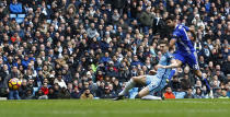 Britain Football Soccer - Manchester City v Chelsea - Premier League - Etihad Stadium - 3/12/16 Chelsea's Diego Costa shoots Action Images via Reuters / Jason Cairnduff Livepic EDITORIAL USE ONLY. No use with unauthorized audio, video, data, fixture lists, club/league logos or "live" services. Online in-match use limited to 45 images, no video emulation. No use in betting, games or single club/league/player publications. Please contact your account representative for further details.