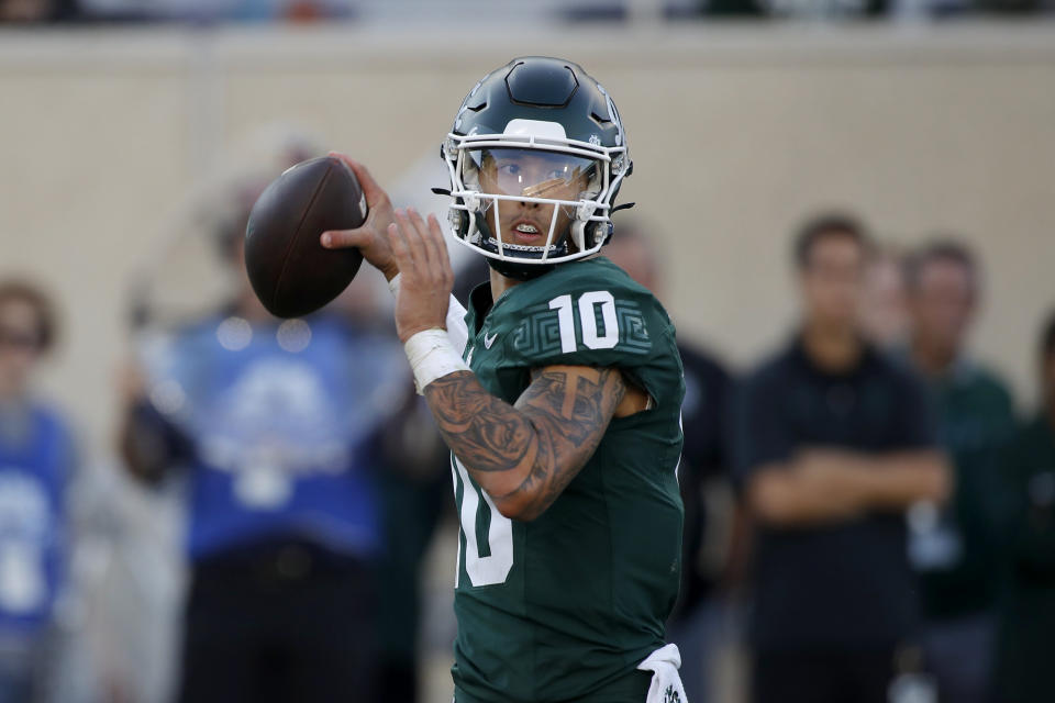 Michigan State quarterback Noah Kim looks top throw against Maryland during the second half of an NCAA college football game, Saturday, Sept. 23, 2023, in East Lansing, Mich. (AP Photo/Al Goldis)