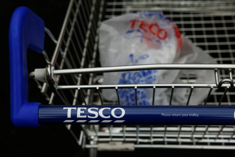 A discarded carrier bag is seen in a shopping trolley outside a Tesco supermarket in London, Britain, January 5, 2015. REUTERS/Luke MacGregor/File Photo