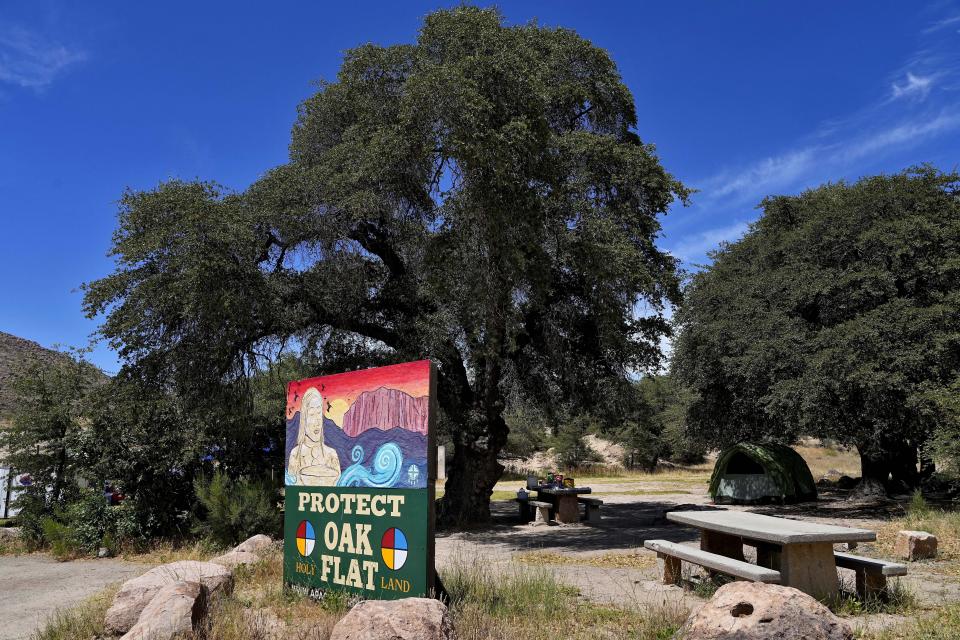 Campers utilize Oak Flat Campground in the Tonto National Forest, Friday, June 9, 2023, in Miami, Ariz. Oak Flat in central Arizona is the subject of a tug of war between people in the historic mining town of Superior who want a huge copper mine developed there for its economic benefits and Native American groups that say the land is sacred and should be protected. (AP Photo/Matt York)