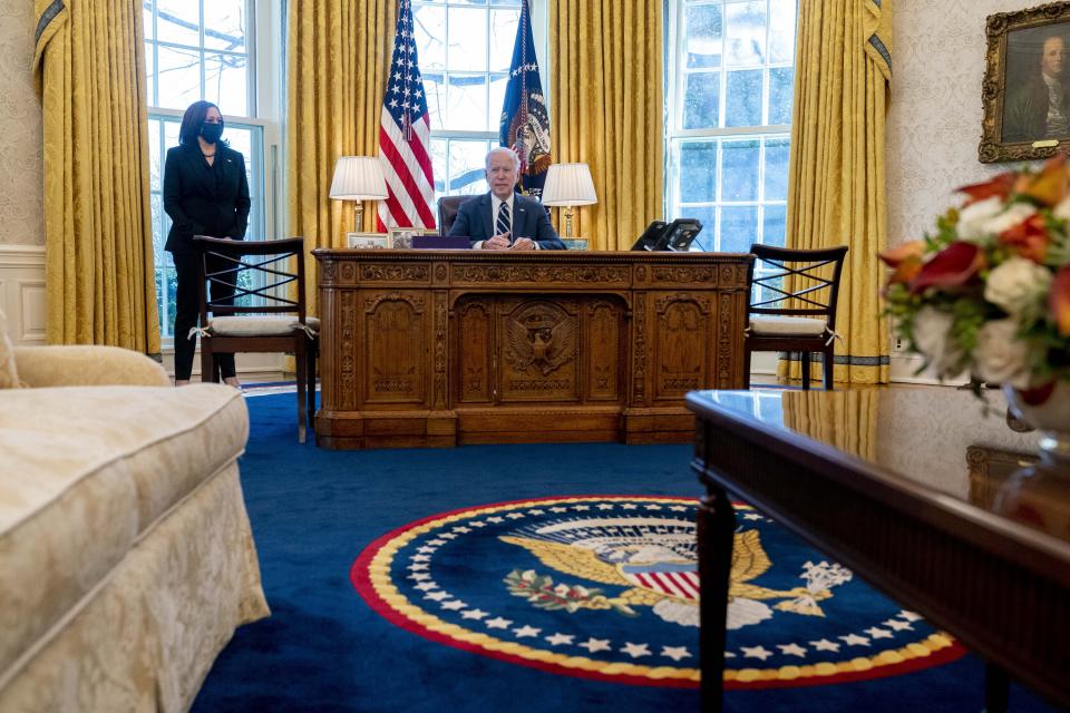 President Joe Biden, accompanied by Vice President Kamala Harris, speaks before signing the American Rescue Plan, a coronavirus relief package, in the Oval Office of the White House, Thursday, March 11, 2021, in Washington. (AP Photo/Andrew Harnik)