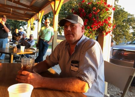 Corn farmer James McCune, who organised the "Prevent Plant Party", sits at The Happy Spot restaurant in Deer Grove