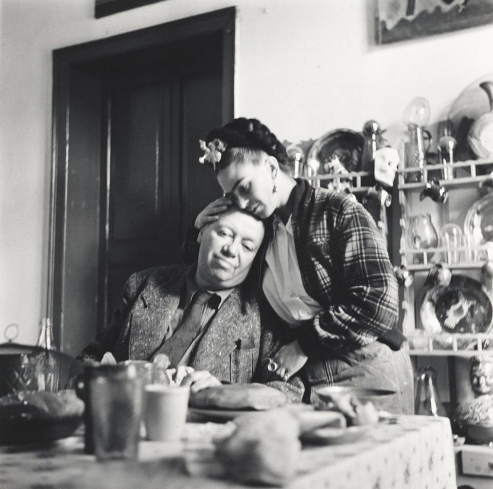Diego Rivera and Frida Kahlo at lunch in Coyoacan, Mexico.
