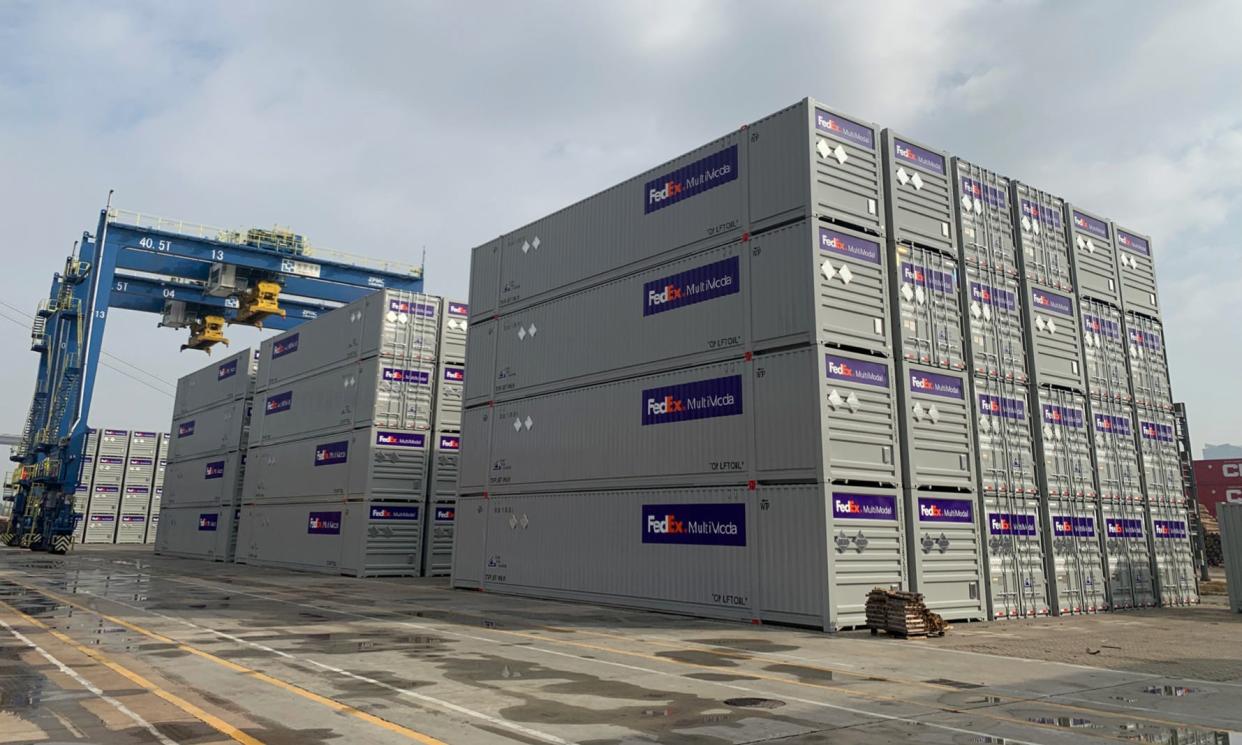 A chartered vessel stacked with FedEx cargo containers prepares to depart China for Port of Hueneme earlier this month.