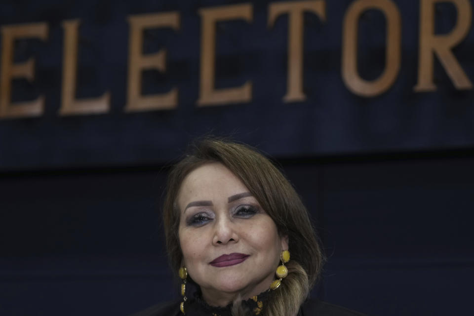 Supreme Electoral Tribunal's president Irma Palencia listens during a press conference in Guatemala City, Monday, Aug. 28, 2023. The Central American country´s top electoral tribunal declared progressive Bernardo Arevalo the winner of the presidential elections just hours after another part of the government suspended his Seed Movement party. (AP Photo/Moisés Castillo)