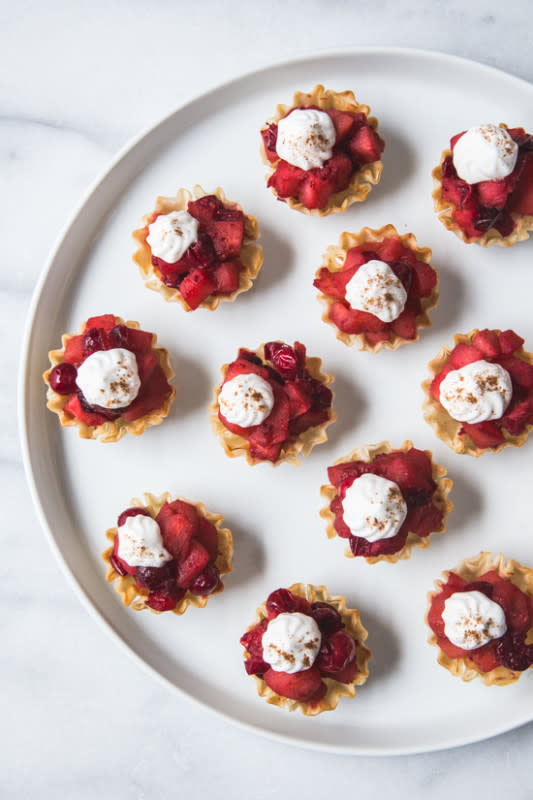 <p>Jelly Toast</p><p>They are simple, sweet, tart and the perfect little bite for your Thanksgiving dessert table.</p><p><strong>Get the recipe: <a href="https://jellytoastblog.com/mini-cranberry-apple-tarts/" rel="nofollow noopener" target="_blank" data-ylk="slk:Mini Cranberry Apple Tarts;elm:context_link;itc:0;sec:content-canvas" class="link ">Mini Cranberry Apple Tarts</a></strong></p>