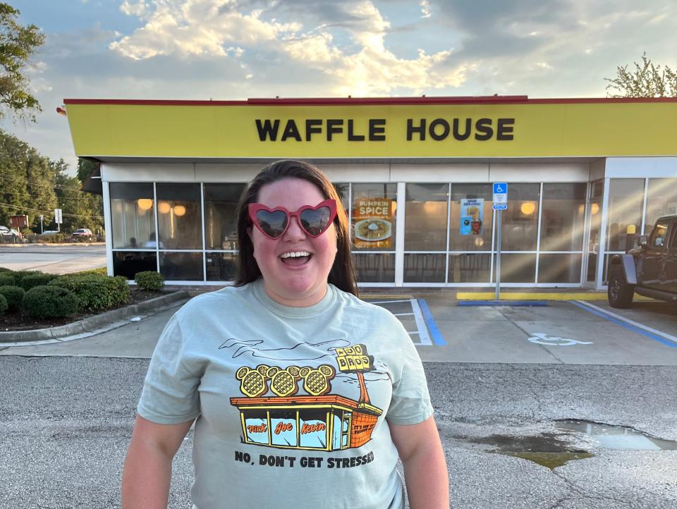 Megan duBois standing outside of Waffle House.