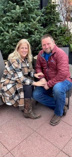 Kathy and Jerry Salisbury, seen here in winter 2023, own Popcorn Paradise in Marine City. They make up to 60 flavors of popcorn throughout the year at their tiny shop, filling orders from all over the country. Christmas is their busiest time of year.