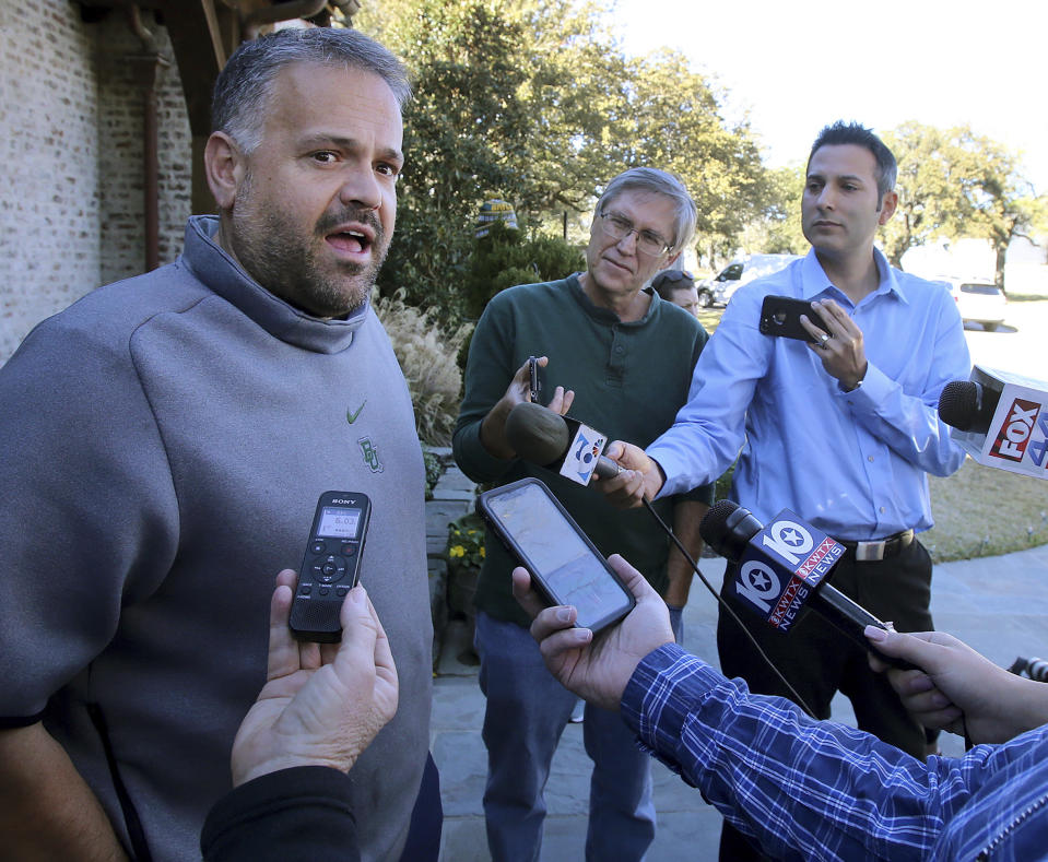 Former Baylor head football coach Matt Rhule speaks to reporters outside his home Tuesday Jan. 7, 2020, in Waco, Texas. According to a person familiar with the situation, the Carolina Panthers are completing a contract to hire Baylor's Matt Rhule as their coach. The Panthers have not spoken publicly about the coaching search. (Jerry Larson/Waco Tribune-Herald via AP)