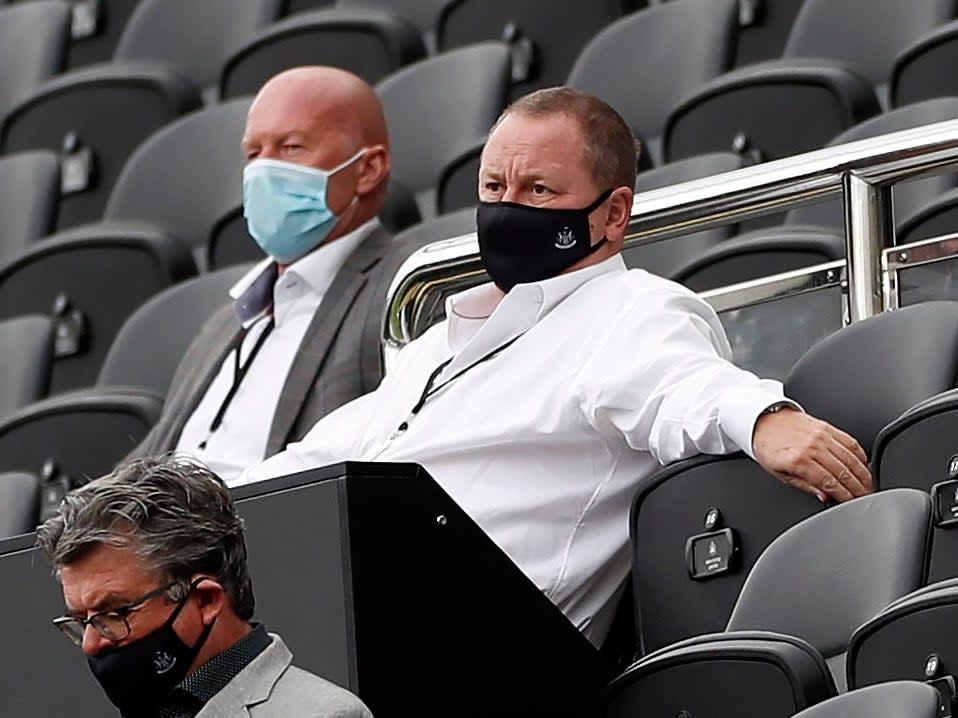 Owner Mike Ashley watches Newcastle's defeat by Brighton in the stands at St James' Park (PA)