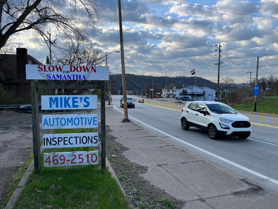 Mike Chionchio of Mike’s Auto Shop put up a sign to remind people to slow down.