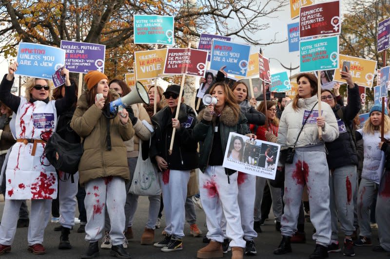 French Jewish women hijacked a feminist march in Paris to condemn their silence to the plea of female victims of Hamas during the 7 Oct terror attack in Israel, on Sunday, November 25, 2023. Many were clad in red-stained joggers, to echo 19-year-old Israeli hostage Naama Levy who was filmed with blood-soaked pants and her achilles tendon slashed during her abduction. Photo by Maya Vidon-White/UPI