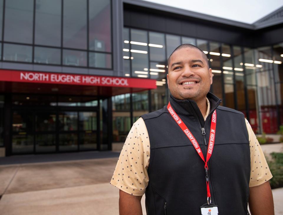 Nain Muñoz, the new principal at North Eugene High School, welcomes students to the new building for the 2023 school year.
