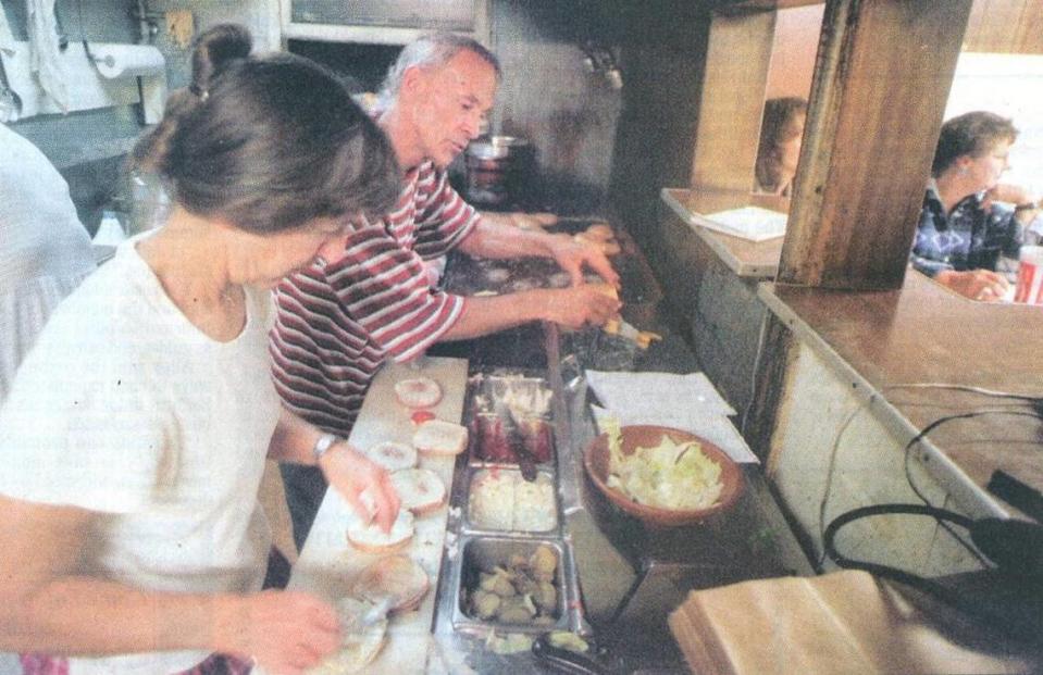 Marilyn and Lee Pettenger work swiftly in the kitchen at Scrubby and Lloyd’s restaurant in San Luis Obispo on Wednesday, Oct. 28, 1998 — the busiest day they’ve had at the 40-year-old eatery, and also their last day in business.