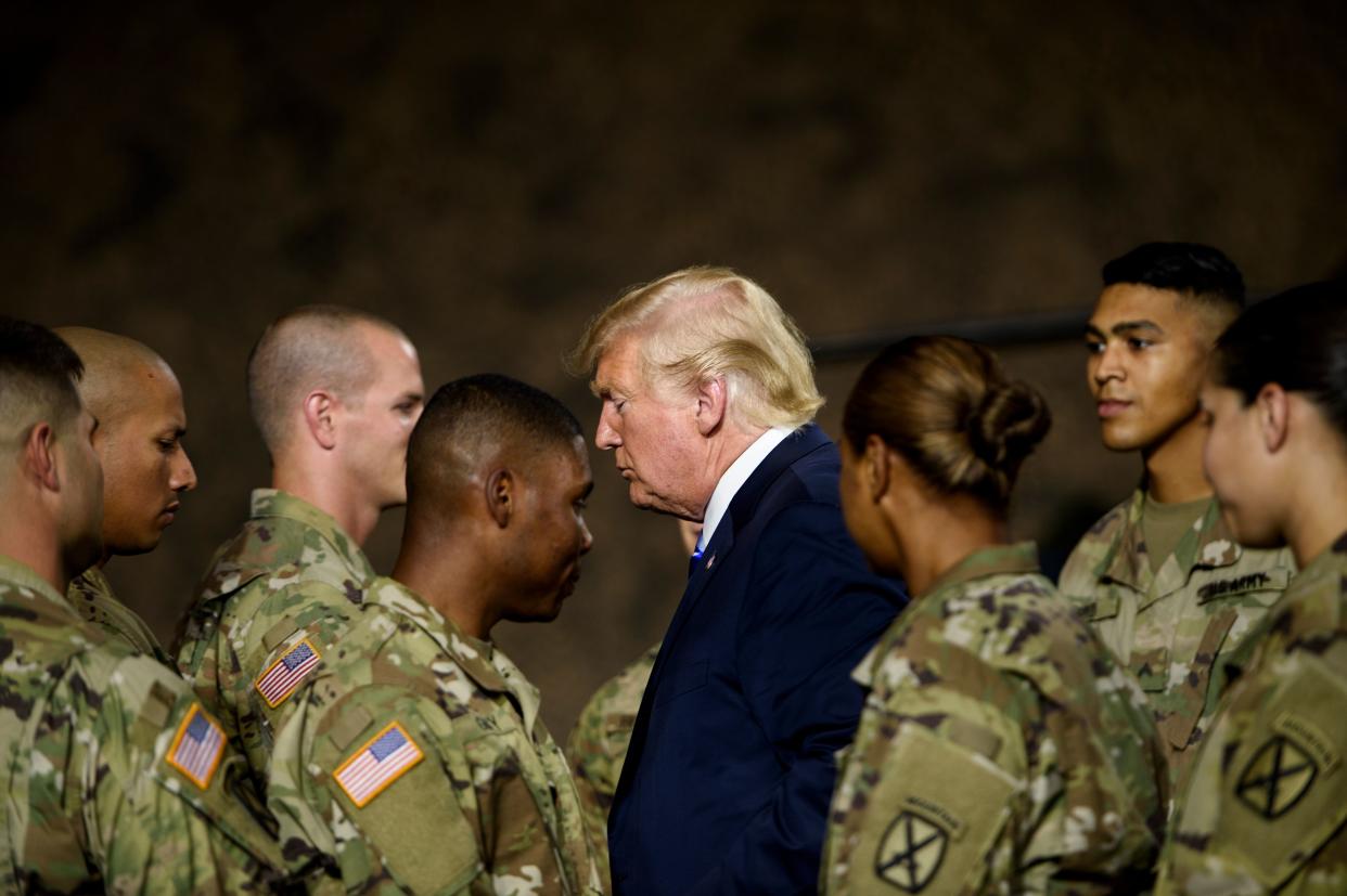 Then-President Donald Trump leaves after signing the John S. McCain National Defense Authorization Act for Fiscal Year 2019 at Fort Drum, N.Y., on Aug. 13, 2018. (Brendan Smialowski/AFP via Getty Images)