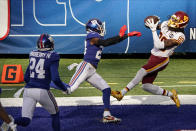 Washington Football Team wide receiver Cam Sims (89) catches a pass for a touchdown in front of New York Giants' Logan Ryan (23) during the second half of an NFL football game Sunday, Oct. 18, 2020, in East Rutherford, N.J. (AP Photo/Bill Kostroun)