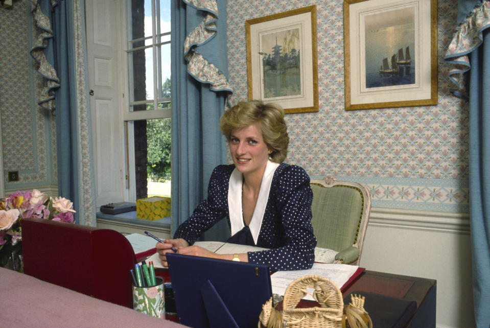 Princess Diana sitting at her desk in Kensington Palace in 1985. [Photo: Getty]