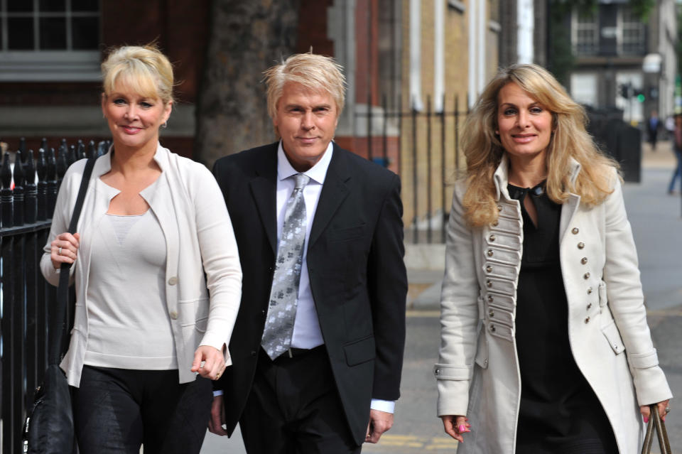 (From left to right) Former Bucks Fizz members Cheryl Baker, Mike Nolan and Jay Aston arrive at the Trade Mark Registry in London, to hear judgement on a long-running dispute over the rights to the group's name.   (Photo by Ian Nicholson/PA Images via Getty Images)
