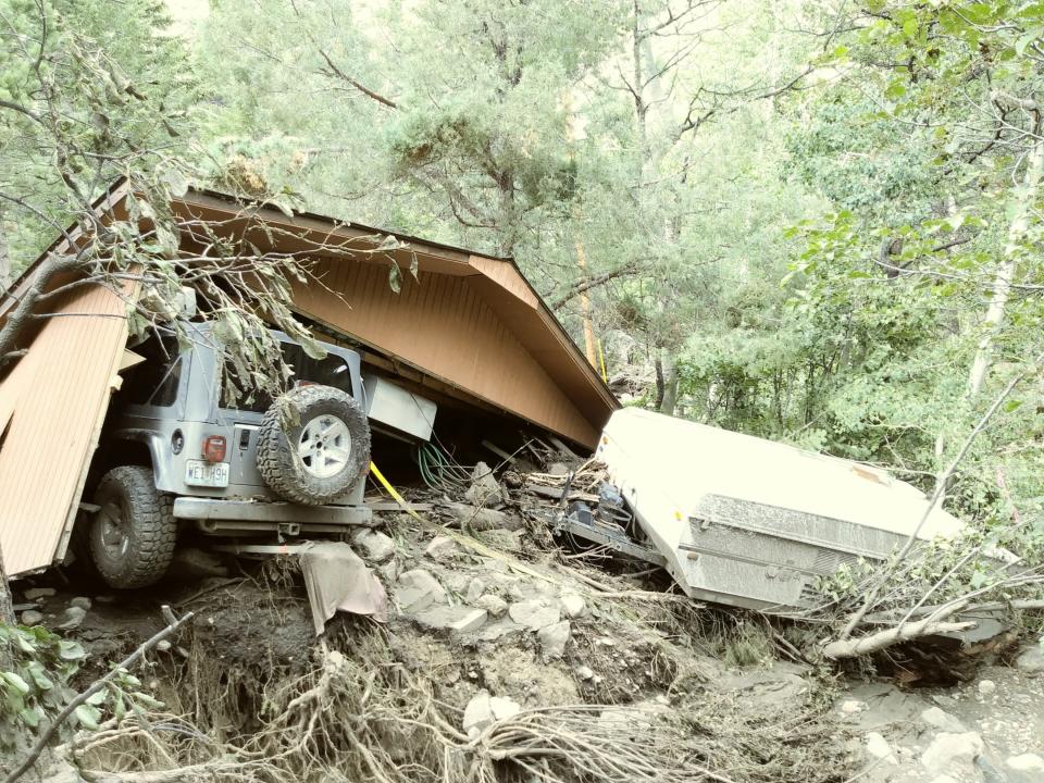 Jerry and Barbara Wilkerson survived a deadly post-fire debris flow that destroyed six homes on Black Hollow Road in Poudre Canyon, Colorado, on July 20, 2021. The flow destroyed the Wilkerson's garage and badly damaged their cabin.