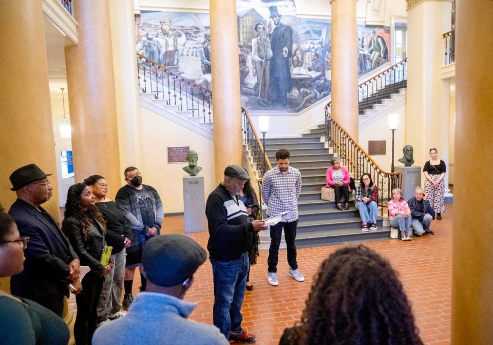 Darryl Thomas reads to the crowd during the third read-in for racial justice of the spring semester inside Penn State’s Old Main on Tuesday, April 16, 2024. After the read-in a letter was delivered to the office of President Neeli Bendapudi. Abby Drey/adrey@centredaily.com