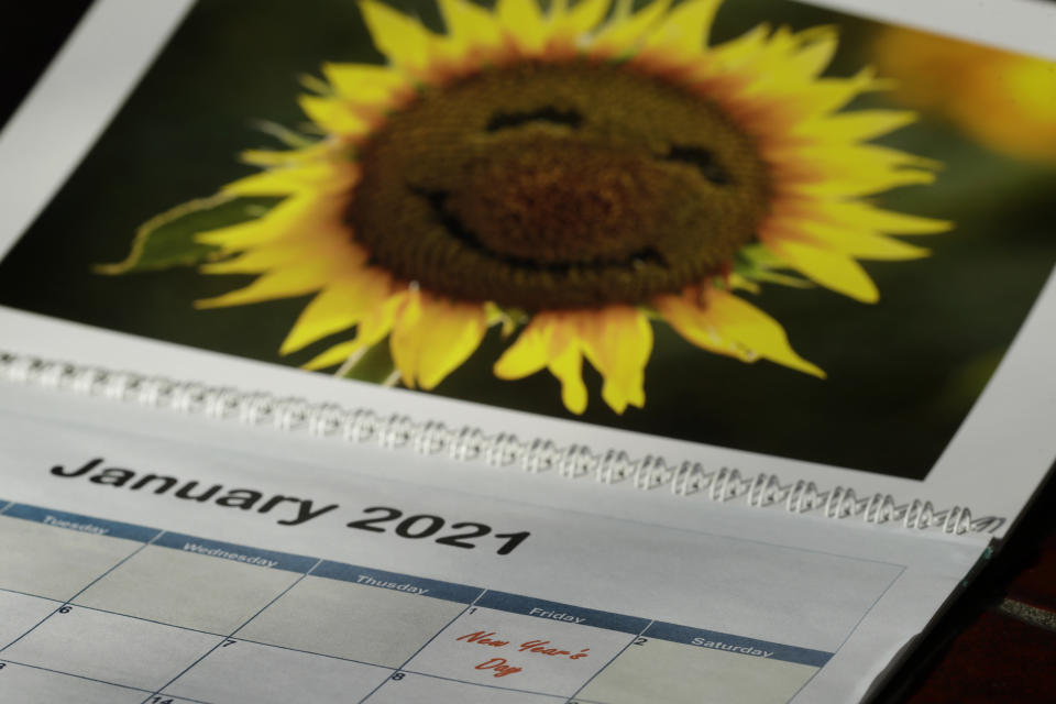 New Year's Day is seen on a 2021 calendar Friday, July 10, 2020, in Overland Park, Kan. 2020 is barely halfway over. That hasn't stopped many people from declaring the year canceled and wishing it would end. (AP Photo/Charlie Riedel)