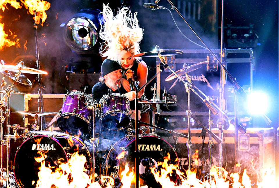 Lars Ulrich and Lady Gaga perform onstage during The 59th Grammy Awards