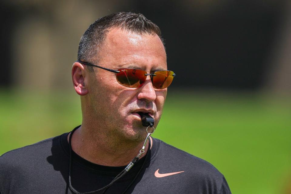 Texas coach Steve Sarkisian blows the whistle to start a drill during the first summer practice for the Longhorns at Denius Fields on Wednesday. Texas enters its firsts eason in the SEC with high expectations after going 12-2 and reaching the College Football Playoff a year ago.