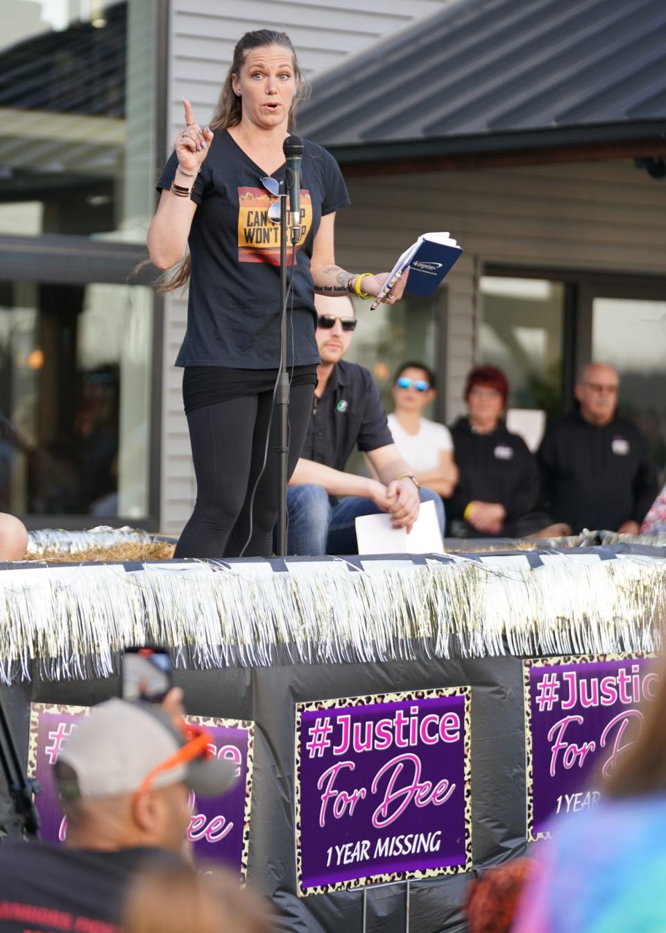 Lindsey Turner, founder of Can’t Stop Won’t Stop, speaks April 23, 2022, at the one-year anniversary vigil for the disappearance of Dee Ann Warner.
