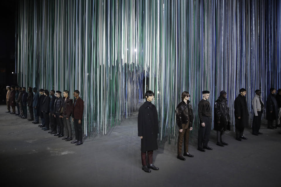 Models wear creations as part of the Ermenegildo Zegna men's Fall-Winter 2020/21 collection, that was presented in Milan, Italy, Friday, Jan. 10, 2019. (AP Photo/Luca Bruno)