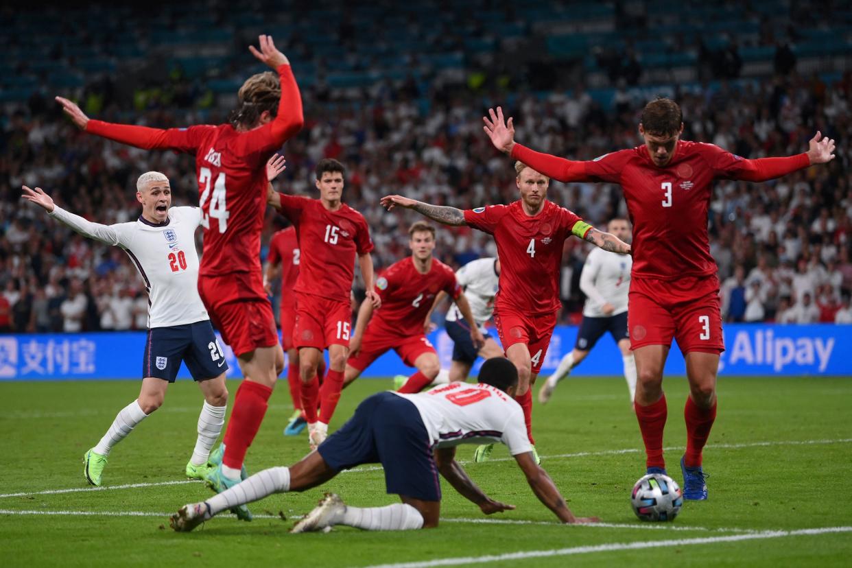 Raheem Sterling wins a penalty for England in the Euro 2020 semi-final against Denmark