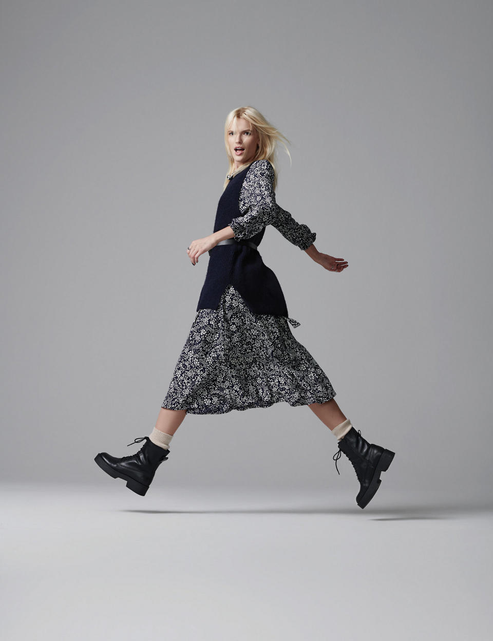 Marks and Spencer's Floral Midi Waisted Dress is a must have this Autumn/Winter, style it with trainers, army boots or heeled boots. (Marks and Spencer)