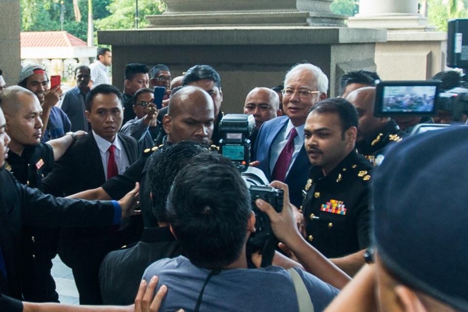 Former Malaysian prime minister Najib Razak arriving at the Kuala Lumpur Courts Complex