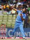 India's Bhuvneshwar Kumar bowls against Bangladesh during their Asia Cup 2014 one-day international (ODI) cricket match in Fatullah February 26, 2014.